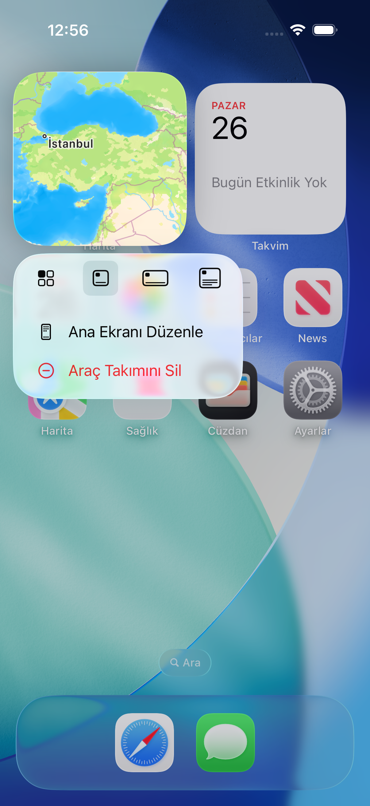iOS 26 araç takımı menüsünde uygulama simgesine dönme düğmesini gösteren gerçek arayüz