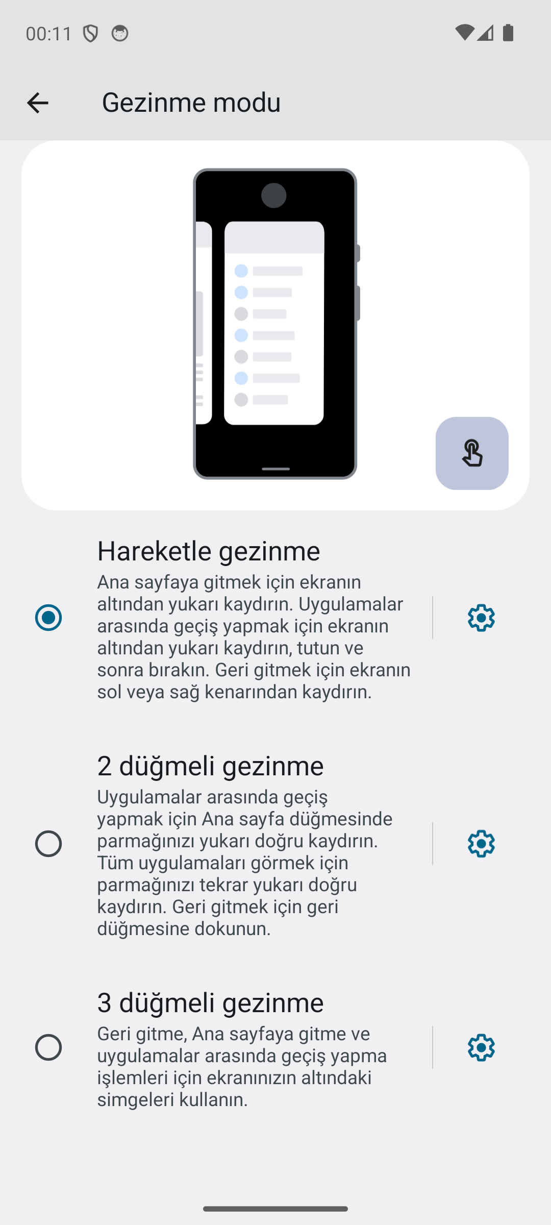 Gezinme modu ekranının alt kısmı: 2 düğmeli ve 3 düğmeli gezinme seçenekleri, her birinin yanında ayar dişlisi